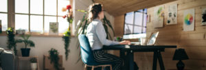 Businesswoman Working In Pet Friendly Office